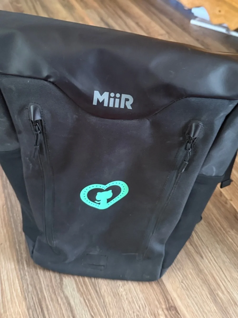 MiiR Black Roll-Top Backpack with Teal Heart Accent, recycled fabric